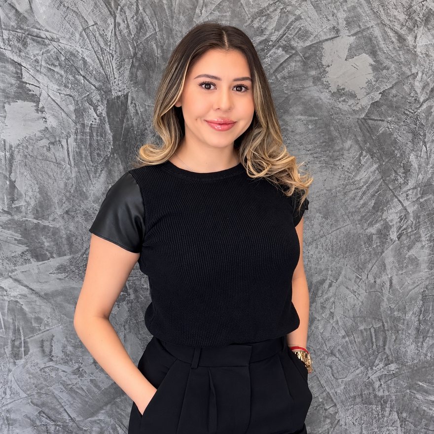 Nicole, Office Manager and Insurance Agent at Rocio Piñon's GEICO office in El Paso